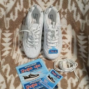 New white Sketcher shoes